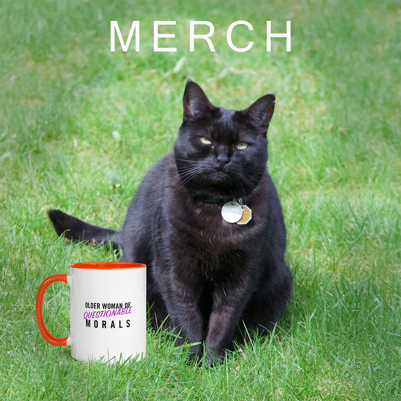 An unimpressed black cat sits on the grass next to a white coffee mug that reads "Older Woman of Questionable Morals" White text reads "MERCH"