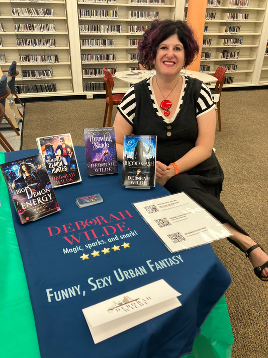 Deb is happy to sign books