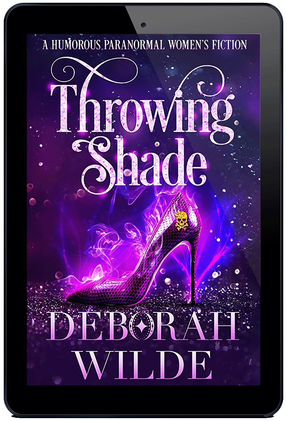 Ebook cover for "Throwing Shade" by Deborah Wilde. A sequinned purple high heeled shoe sits on a field of sparkles with sparks and smoke rising from it. On the shoe is a glittery skull with heart shaped eye sockets and a large glittery bow on its head.