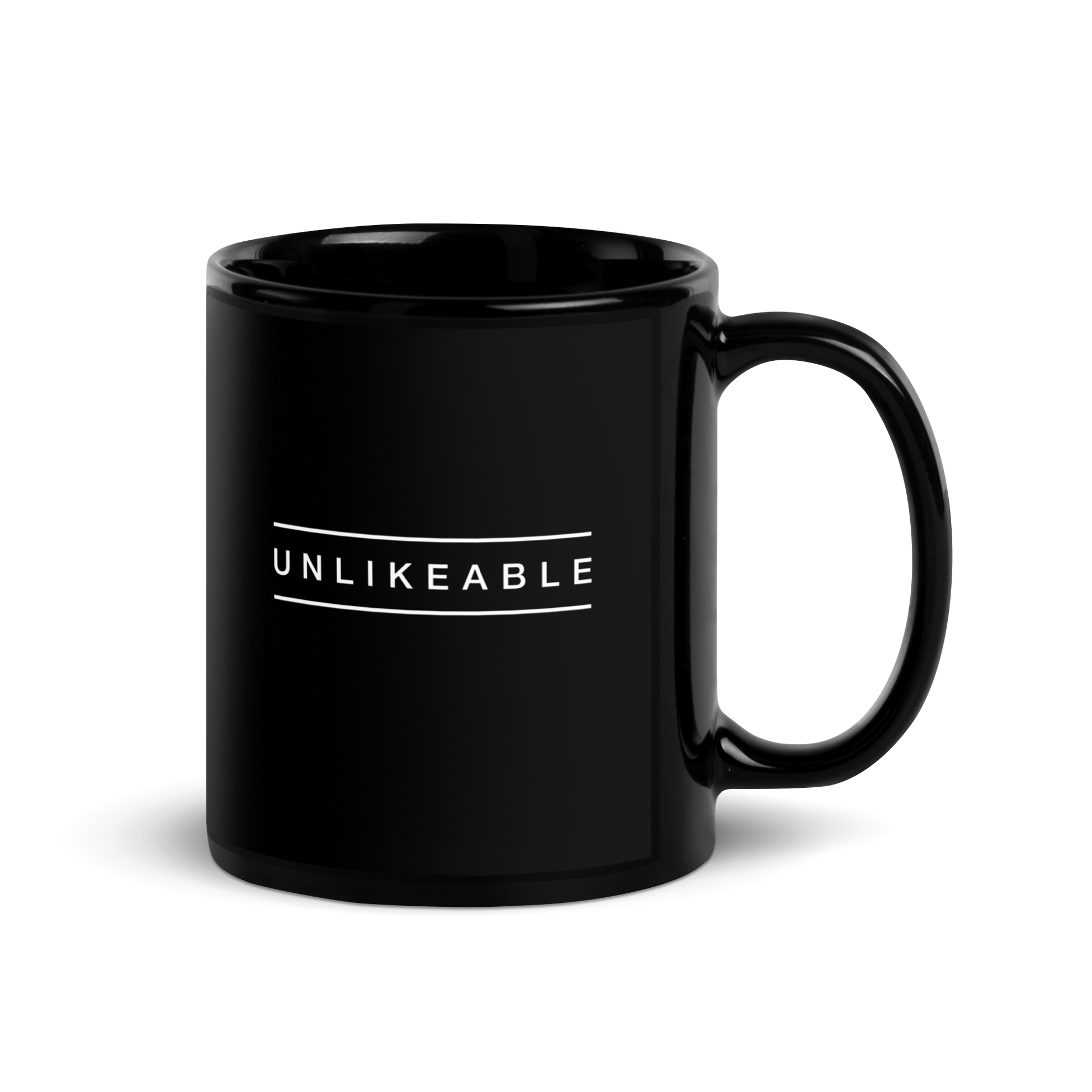 black glossy mug with the word unlikeable in white.