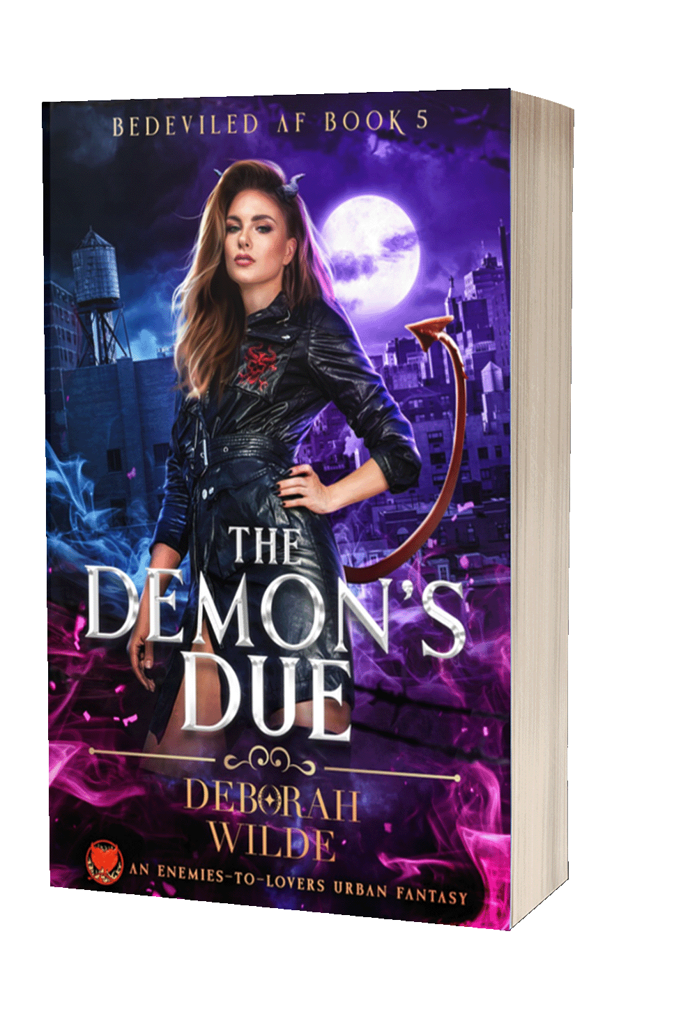 Paperback cover of "The Demon's Due" featuring a woman in a black leather trench coat with horns and a tail standing in front of a city at night.